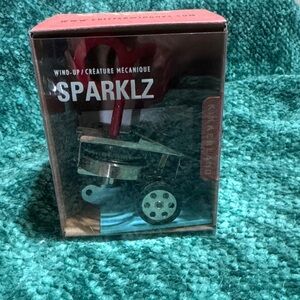 Kikkerland Sparkz Wind-Up Toy - Silver